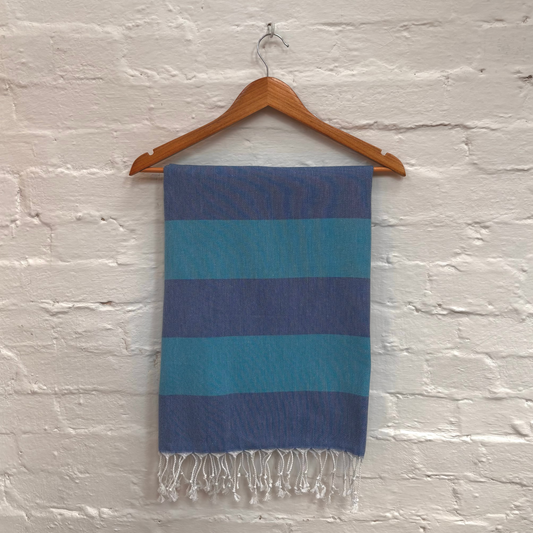 Blue striped towel with tassels
